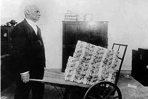 money in wheelbarrow